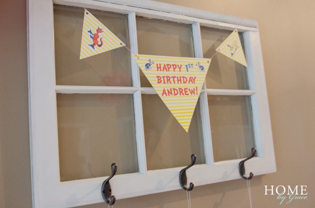 dr seuss birthday party decorations in kitchen dining area on vintage window wall hook